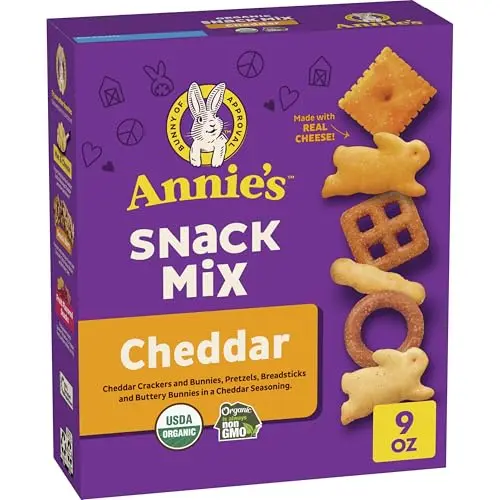 Annie's Cheddar Snack Mix box with assorted crackers and pretzels
