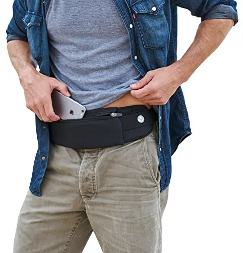 The Belt of Orion slim black neoprene travel belt worn on the waist.