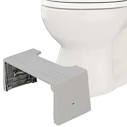Squatty Potty Porta Traveler foldable toilet stool in gray, shown folded for compact storage.
