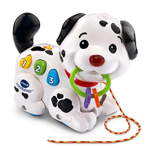 VTech Pull and Sing Puppy plush dog toy on wheels with pull string