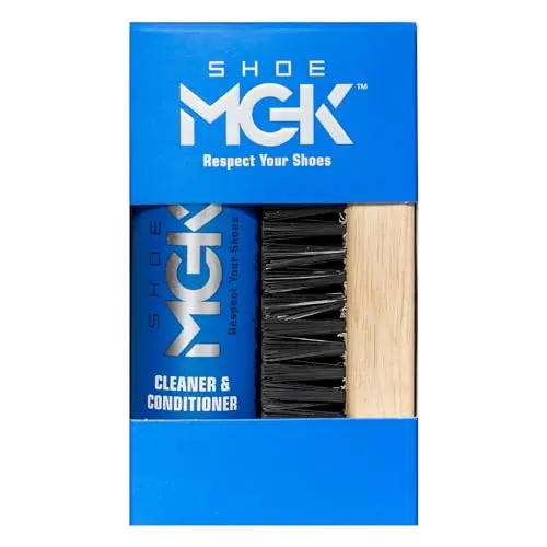 Shoe MGK Starter cleaning kit with bottle and brush on a wooden table.