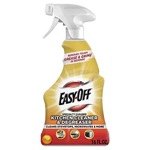Easy-Off Specialty Kitchen Degreaser Lemon spray cleaning a stovetop