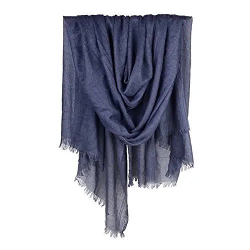 Iristide long lightweight scarf in denim blue, shown on a beach
