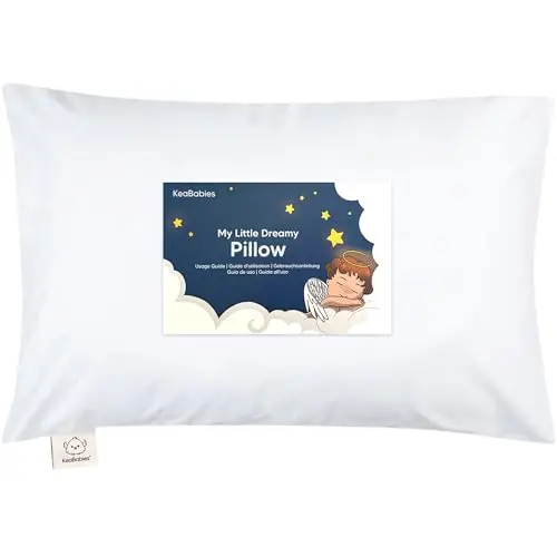 KeaBabies toddler pillow with organic cotton pillowcase, shown in soft white on a bed.