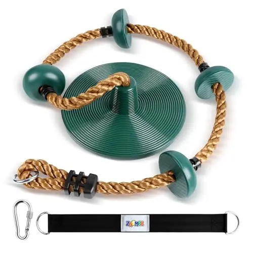 Green disc swing and climbing rope with foot platforms hanging from a tree