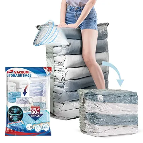 Six cream-colored cube-shaped vacuum storage bags standing upright