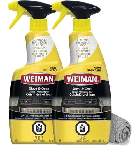 Weiman Heavy Duty Stove and Oven Cleaner foaming on a stove grate.