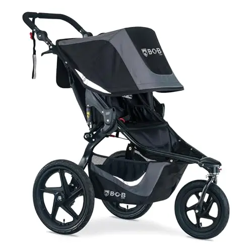 BOB Gear Revolution Flex 3.0 jogging stroller in Graphite Black on a gravel path