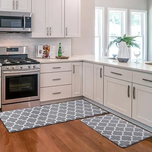 Two-piece grey cushioned anti-fatigue kitchen mat set on a wood floor