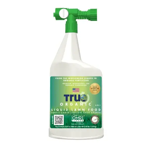 True Organic Liquid Lawn Food bottle with hose-end sprayer attached