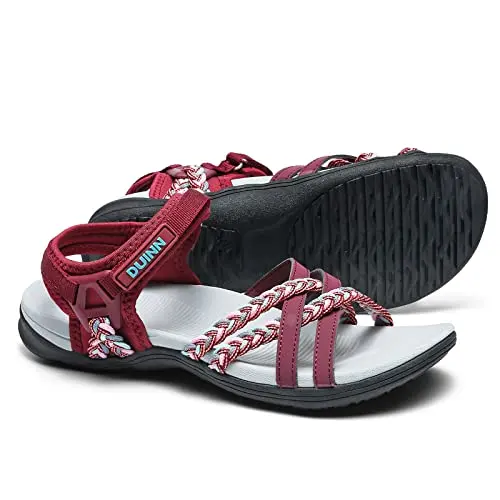 UBFEN women's hiking sandal with adjustable hooks on a rocky path