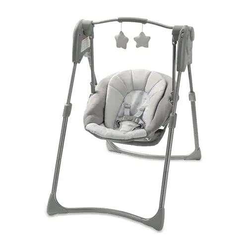 Graco Slim Spaces Compact Baby Swing in a neutral gray color, showing its narrow profile and carry handle.