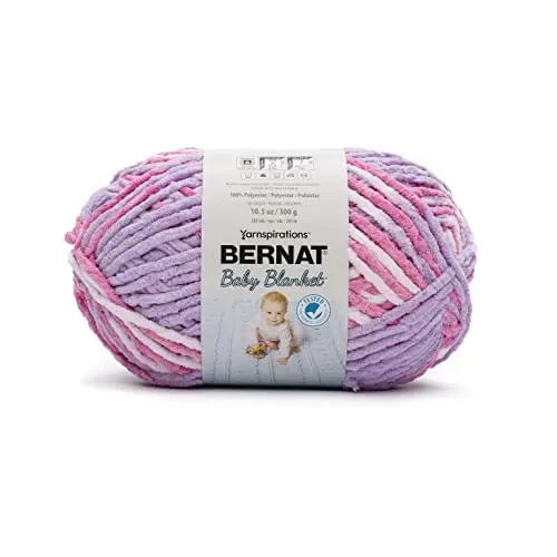 Bernat BABY BLANKET BB Pretty Girl Yarn, a large, fluffy white skein of super bulky yarn.