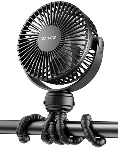 Gaiatop mini portable stroller fan in black, highlighting its small safety gaps in the front cover.