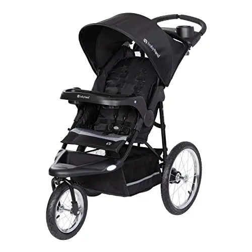 Baby Trend Expedition Jogger stroller in Dash Black on an uneven trail