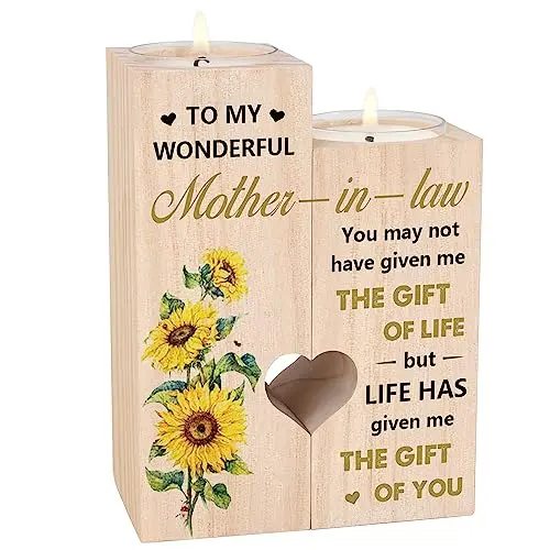A small, rustic wooden candlestick holder engraved with a heartfelt message for a mother-in-law.