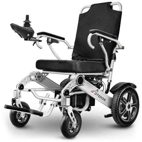 Aotedor silver electric wheelchair on outdoor terrain