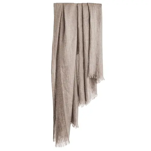 Harewom lightweight gauze shawl wrap in khaki, shown as a beach cover-up