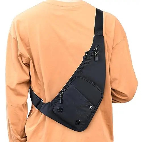 Peicees Slim Sling Bag worn across the chest in a city setting
