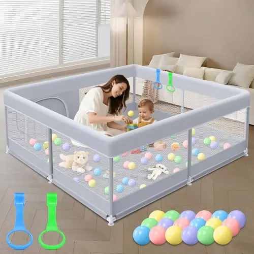 XVISHX grey baby playard with balls and handles, set up indoors