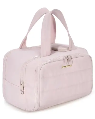 BAGSMART puffy pink toiletry bag opened wide showing upright bottles