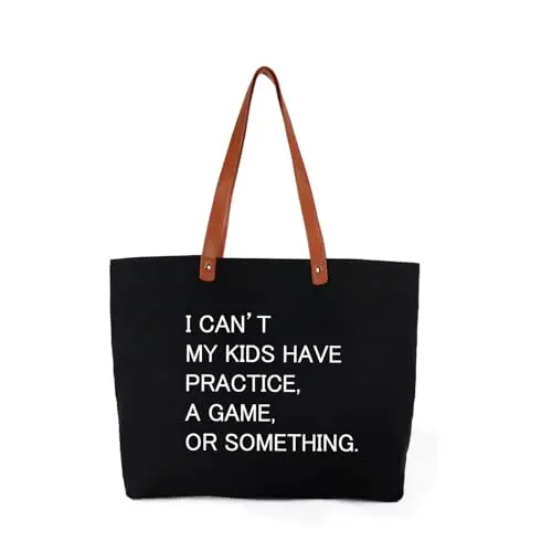 Black canvas tote bag with funny sports mom quote and leather handles.