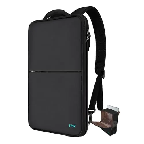 ZINZ slim black backpack in compact mode next to a laptop