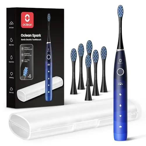 Oclean electric toothbrush for adults with travel case and multiple brush heads.