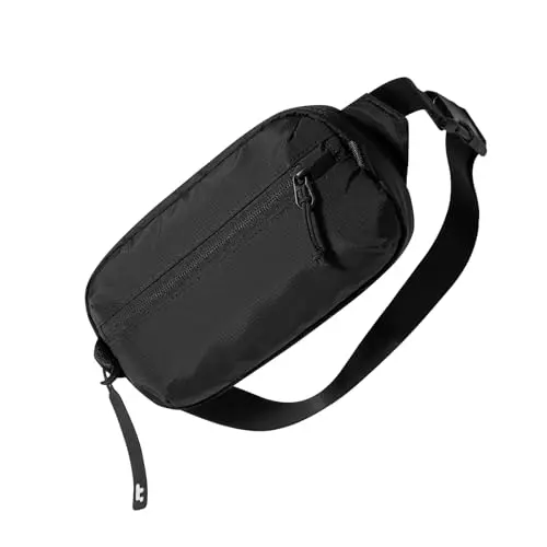 tomtoc 1.5L minimalist sling bag in black, showing its slim profile.