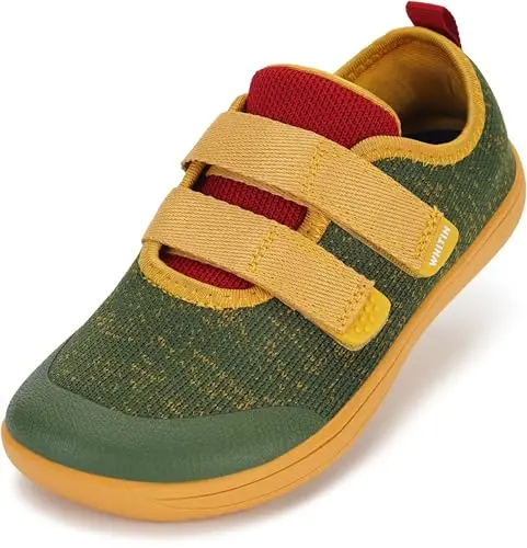 WHITIN green minimalist barefoot sneakers for toddlers on a wooden floor