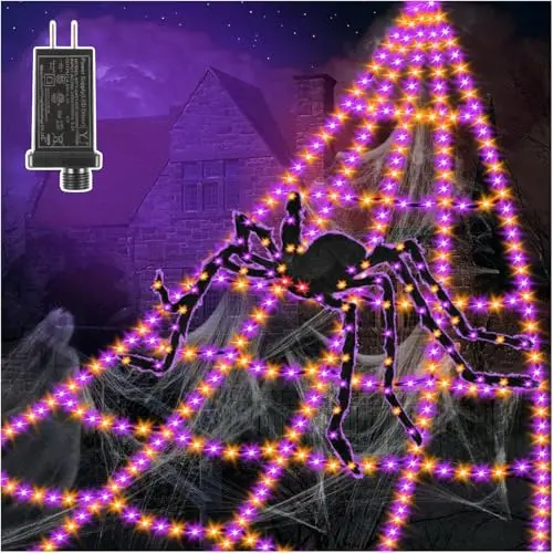 VITI spider web lights with purple and orange LEDs in a Halloween yard display