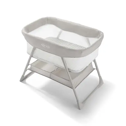 Graco DreamMore Bedside Bassinet showing its one-hand fold mechanism