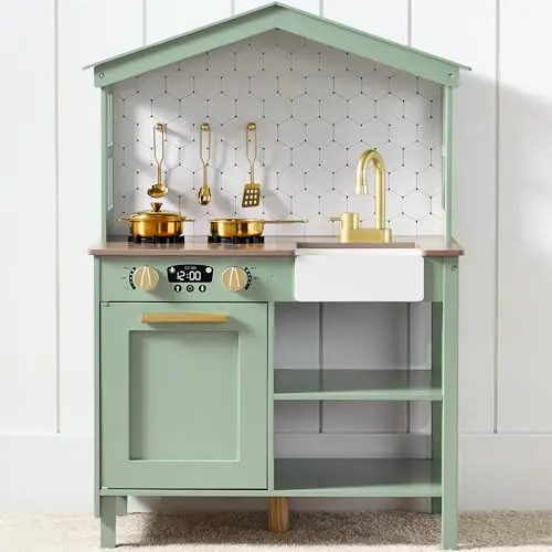Sage green farmhouse-style wooden play kitchen with windows and storage