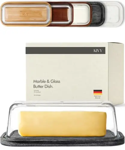 KIVY Butter Dish with black marble base and glass lid on a kitchen counter
