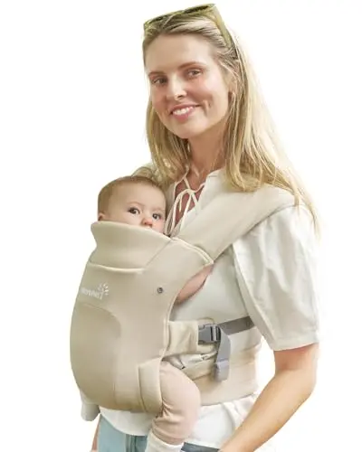 GROWNSY cream-colored baby carrier, showing its foldable head support pad and buckle closures.