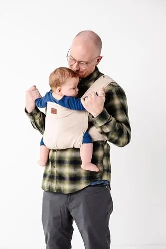 Happy! Original Baby Carrier in a neutral color, showing ergonomic design with adjustable straps