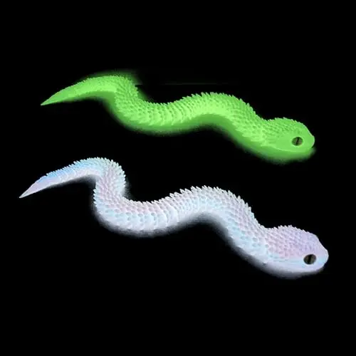 Two long, green and black 3D printed flexible snake toys that can be bent into various poses
