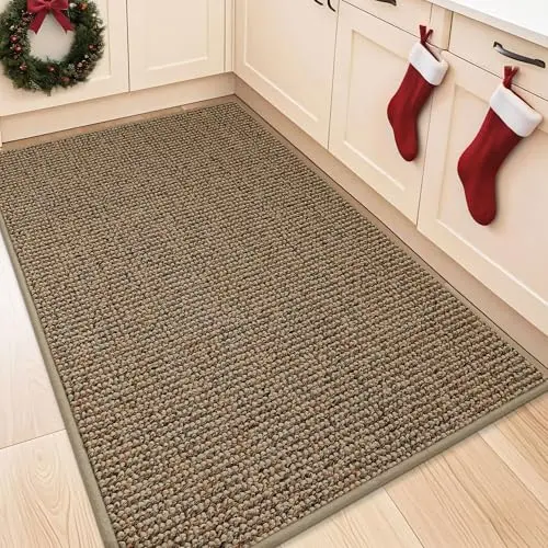 Large taupe colored absorbent kitchen runner rug on hardwood floor