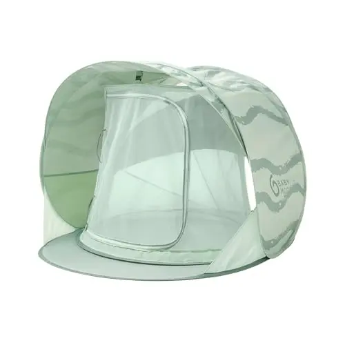 Green Lagoon Babymoov cooling tent with an integrated fine mesh net and adjustable awning.