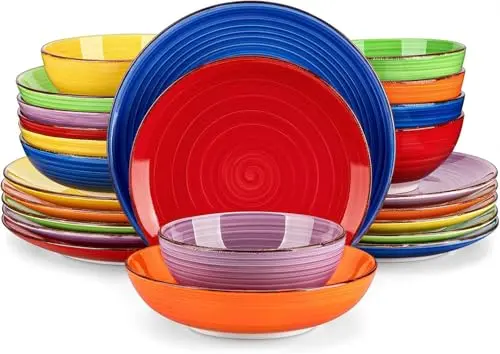 Vancasso Bonita dinnerware set showing plates and bowls with handpainted spiral pattern in blue and green tones