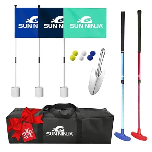 Sun Ninja beach golf set with putters, balls, and flags on wet sand