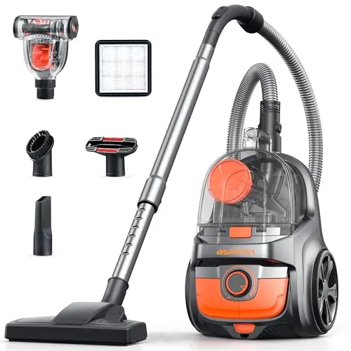Aspiron persimmon-colored canister vacuum with tools on a hard floor