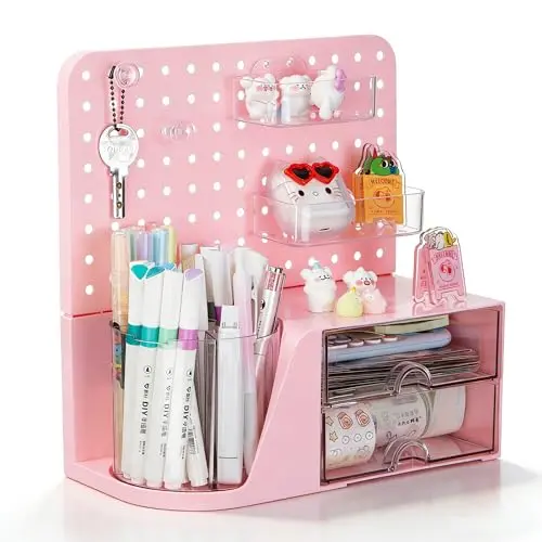 Comix pink plastic desk organizer with rotating pen holder, drawers, and pegboard
